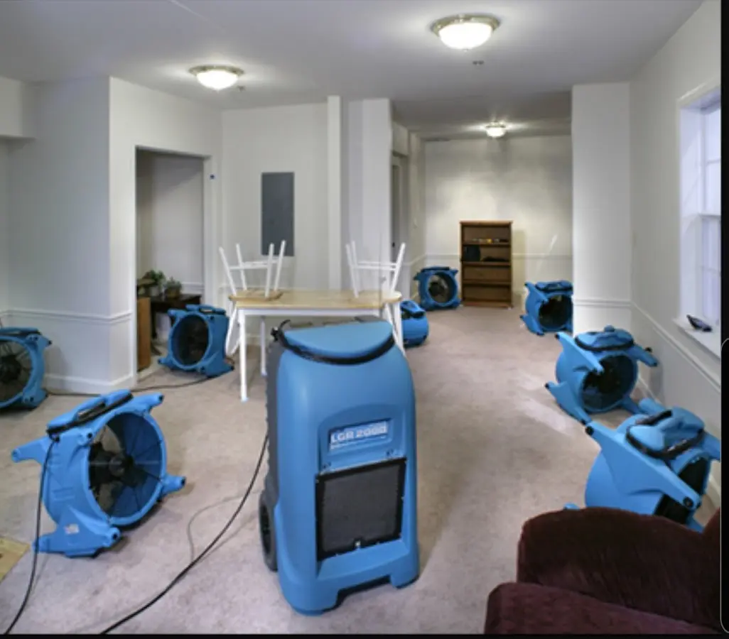 Air movers and dehumidifier setup for Water Damage Restoration in Westfield